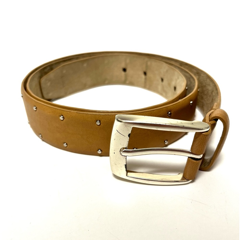 ladies tan belt with small silver tone studs. Some marks on buckle. size 2XL.